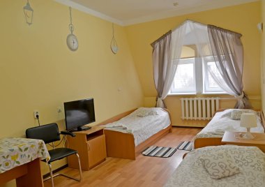 Üç Kişilik Oda iç duvarda Rus yazar A.P. Çehov portresi ile