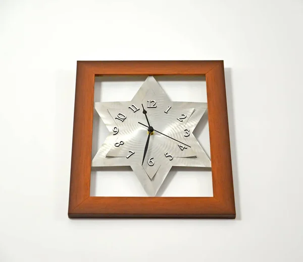 Wall clock with dial shaped like David 's star — Stock Photo, Image