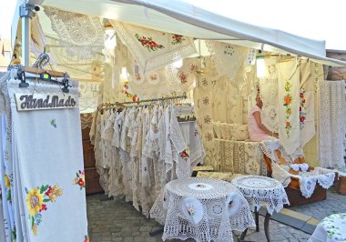 GDANSK, POLAND - AUGUST 10, 2017: Handmade tablecloths and napkins are sold in the market