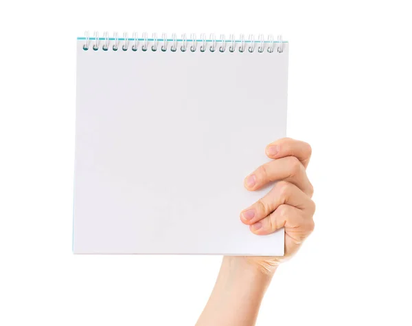 Hand holding blank notebook — Stock Photo, Image