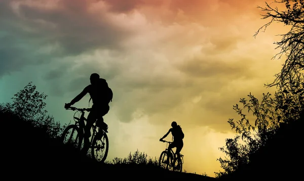 Couple cycling outdoor — Stock Photo, Image