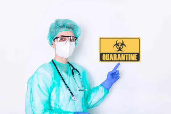 Portrait of doctor, nurse in protective clothes during coronavirus pandemic next to quarantine sign. Epidemic, pandemic of coronavirus covid 19. Doctor, patient in respirator.