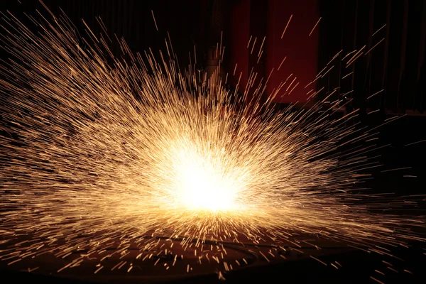 CNC cutting with sparks close up — Stock Photo, Image