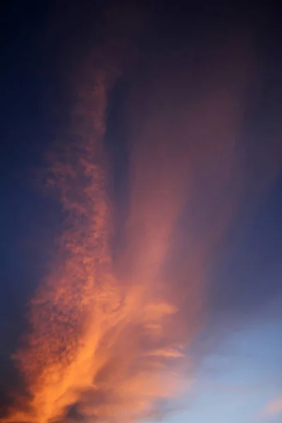 Sunset and clouds in the blue sky — Stock Photo, Image