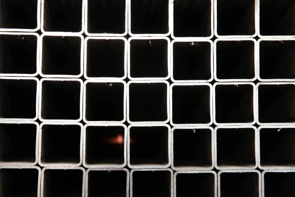 Perfis de aço quadrado recém-fabricados — Fotografia de Stock