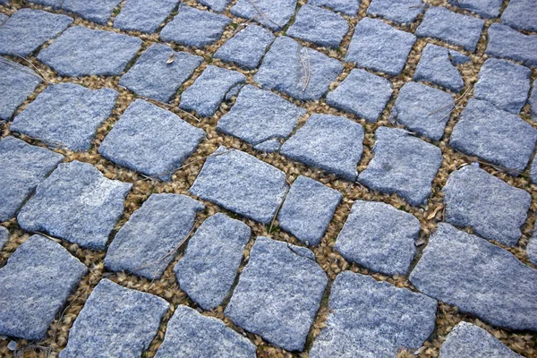 Grå Kullerstensväg Som Bakgrund — Stockfoto