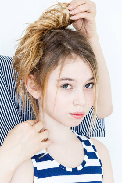 Cute girl with blond long hair