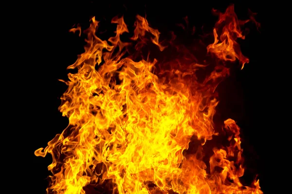 Czerwony ogień płomień na czarnym tle — Zdjęcie stockowe