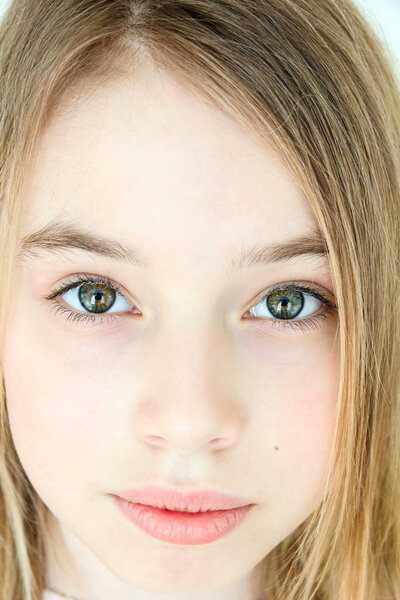 Cute girl with blond long hair