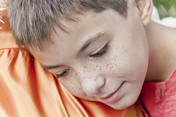 Son is listening to mothers pregnant belly