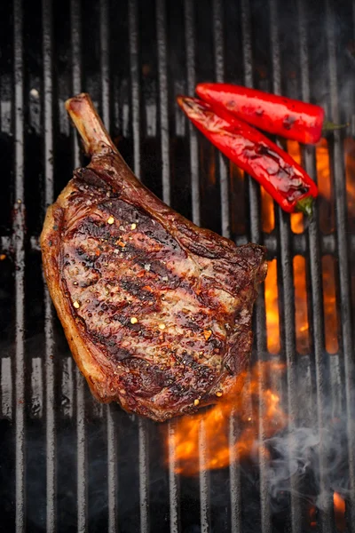 Beef steak on barbecue grill — Stock Photo, Image