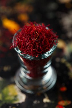 saffron threads in vintage glass bowl  clipart