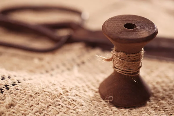 Old reel with hemp tread — Stock Photo, Image