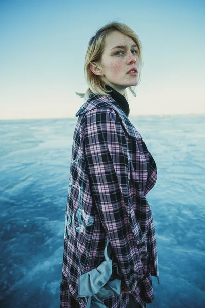 Portrait of a young girl with an old clothes on the background o — Stock Photo, Image