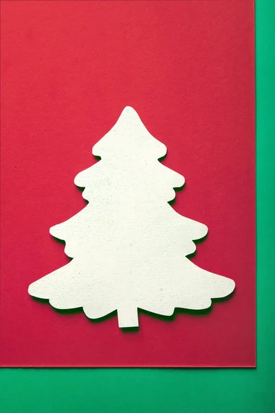 Christmas greeting card background with xmas tree paper cutout — Stock Photo, Image