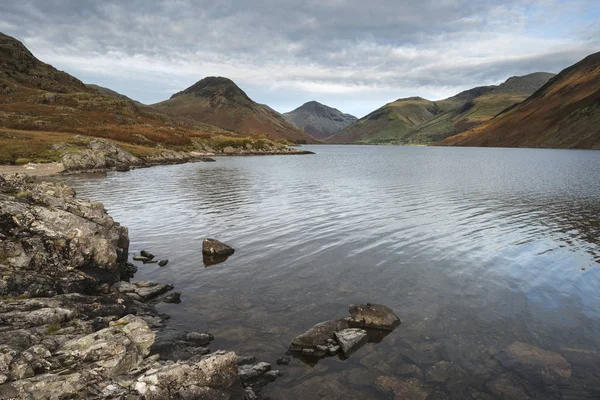 Beautiful sunset landscape image of Wast Water and mountains in — Stock Photo, Image