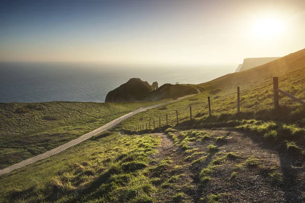 Krásný západ slunce krajiny obraz Durdle Door na jury certifikáty pravosti — Stock fotografie