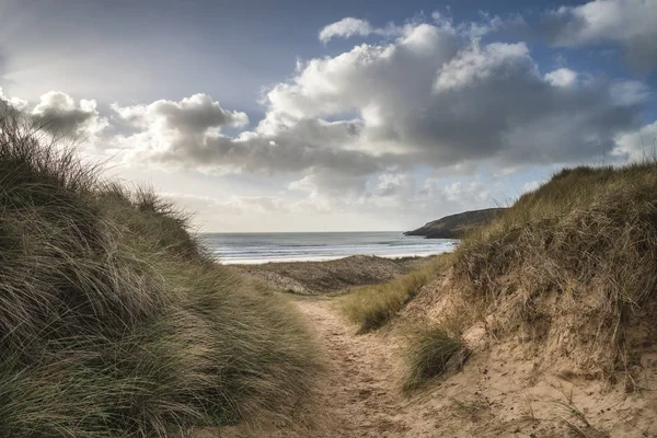 Beautiful landscape image of Freshwater West beach with sand dun — Stock Photo, Image