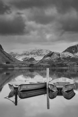 Beautiful  black and white Winter landscape image of Llyn Nantll clipart