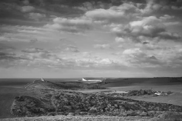 Stunning black and white landscape image of Belle Tout lighthous