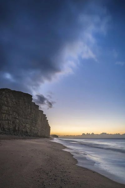 Beautiful vibrant long exposure sunrise landscape image of West — Stock Photo, Image