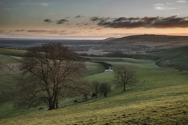 Stunning vibrant sunrise landscape image over English countrysid — Stock Photo, Image