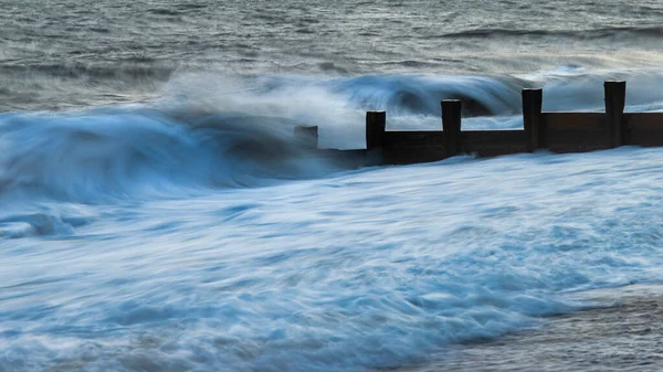 Beautiful Abstract Long Exposure Landscape Image Waves Crashing Groynes Beach — Stock Photo, Image