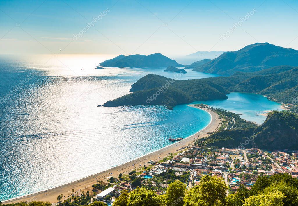 Oludeniz beach in Turkey view from above with back sunset light