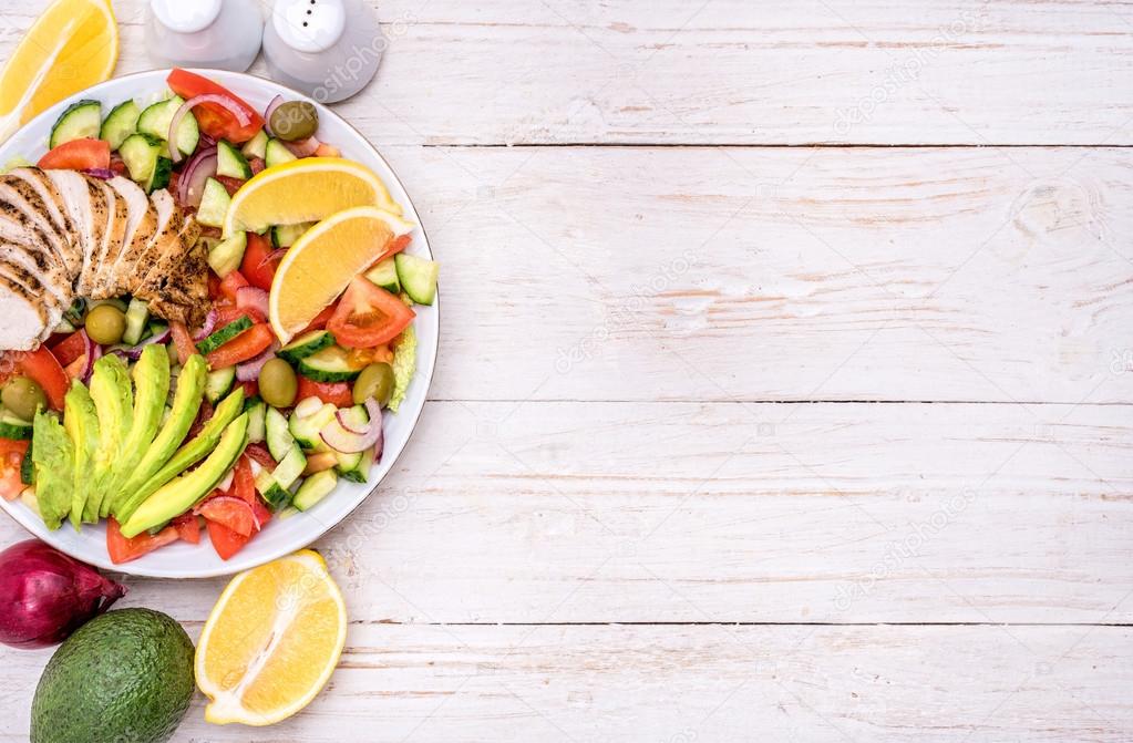 Mediterranean chicken salad with avocado . 