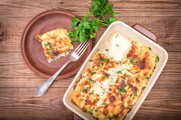 Chicken lasagna and white cheese . — Stock Photo, Image