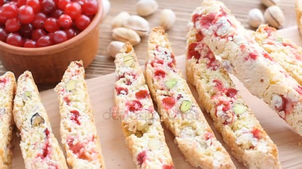 Biscotti with pistachios and cranberries. — Stock Video