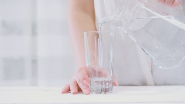 Water Pouring Pitcher Glass — Stock Video