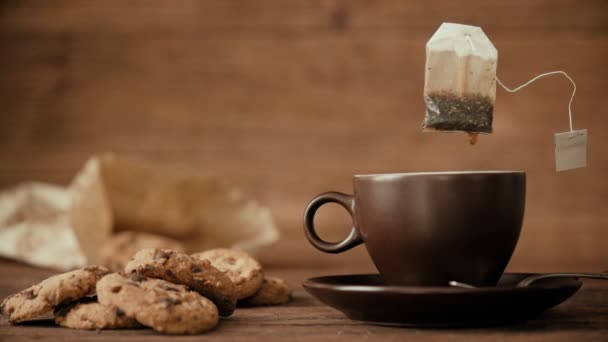 Cinemagraph Sac Thé Égouttant Dans Une Tasse Thé Personne Photo — Video