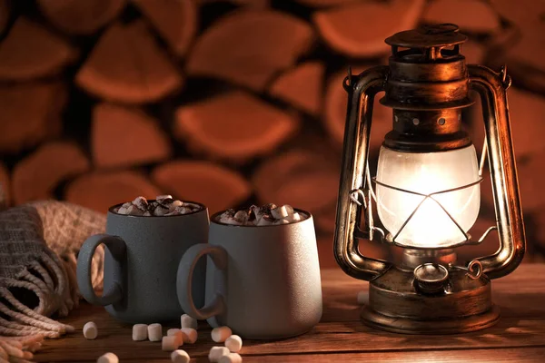 Antique Oil Lamp Mugs Hot Cocoa Firewood Background — 图库照片