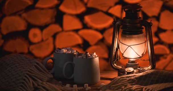 Antique Oil Lamp Mugs Hot Cocoa Firewood Background — 비디오