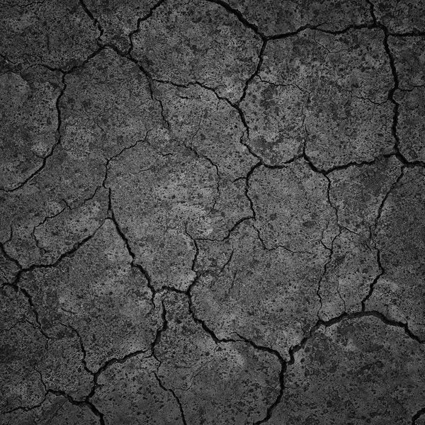 Black Dry Drought Land with Chaps as Natural Background