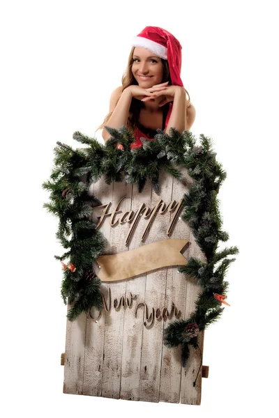 Mulher bonita em traje de Papai Noel posando em estúdio — Fotografia de Stock