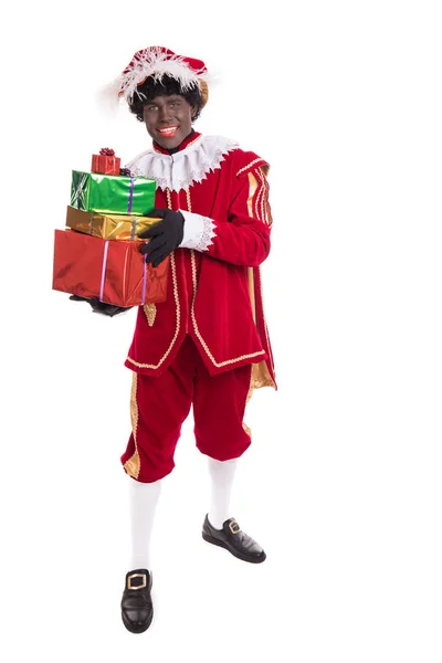 Zwarte Piet or Black Pete with gifts full length portrait, Sinte — Stock Photo, Image