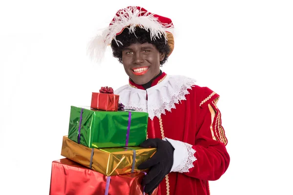Zwarte Piet eller Black Pete med gåvor porträtt, Sinterklaas även — Stockfoto