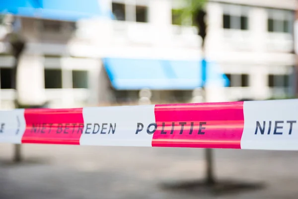 Nederlandse rode lijn op een plaats delict onderzoek — Stockfoto