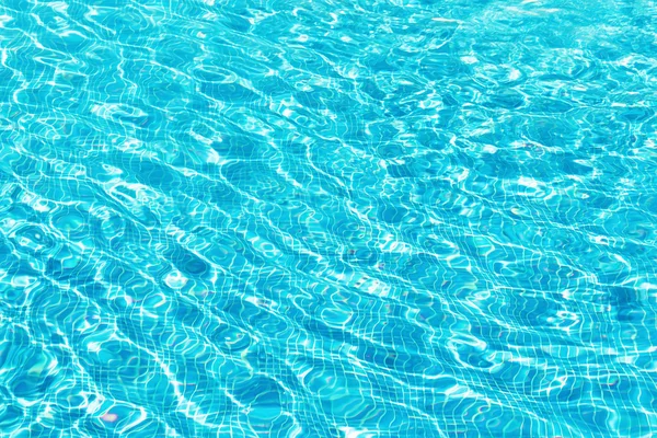 Blue swimming pool rippled water background — Stock Photo, Image