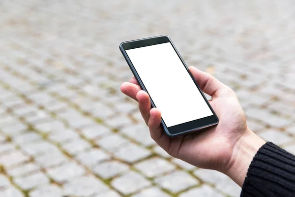 Man uses his Mobile Phone outdoor — Stock Photo, Image