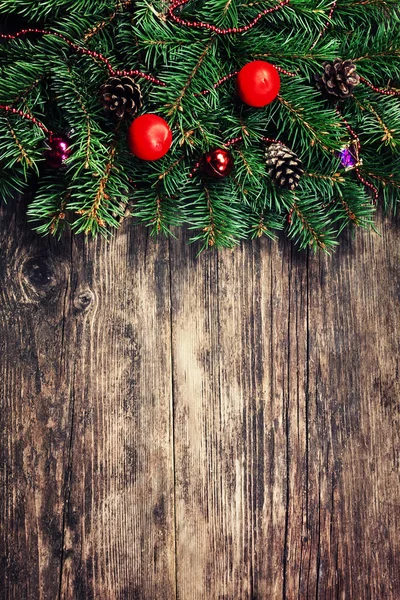 Christmas fir tree branches with toys — Stock Photo, Image