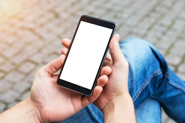 Man uses his Mobile Phone outdoor — Stock Photo, Image