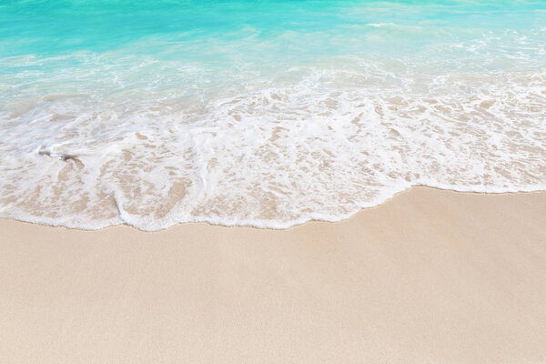 Wave of the sea on the sand beach