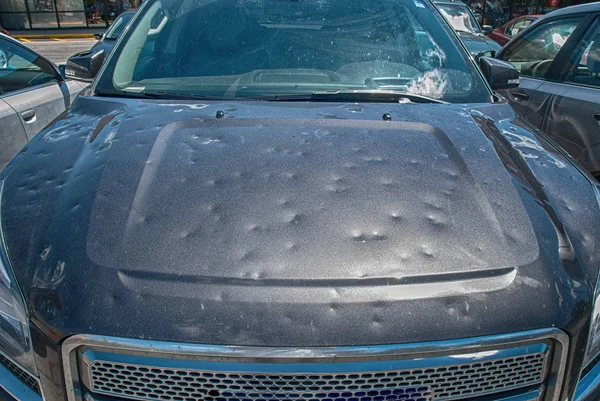 Hail damage to car — Stock Photo, Image