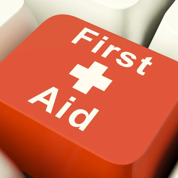 First Aid Computer Key Showing Emergency Medical Help — Stock Photo, Image