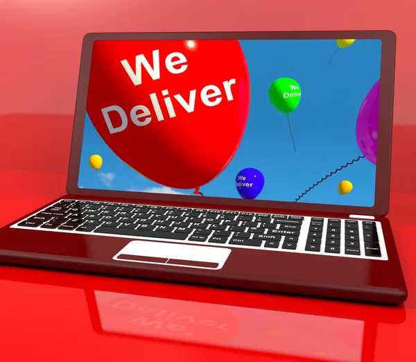 We Deliver Balloons On Computer Showing Delivery Shipping Servic — Stock Photo, Image