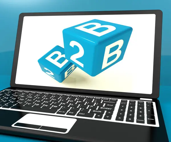 Iş ve ticaret B2B zar dizüstü bilgisayar üzerinde gösterir — Stok fotoğraf