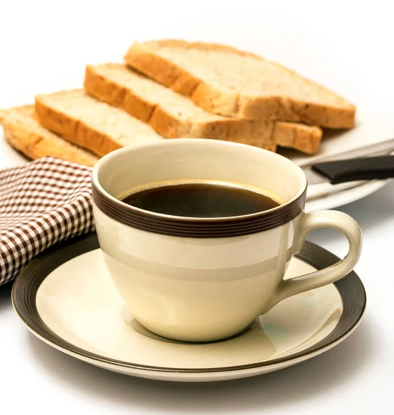 面包和咖啡表明吃饭时间和黑色 — 图库照片